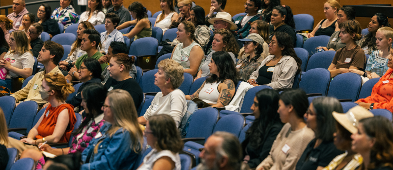 People seated in auditorium